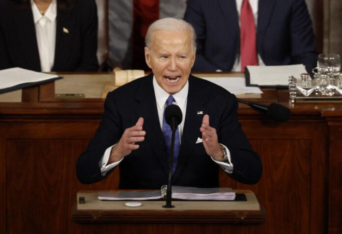 Biden promete seguirá con su candidatura